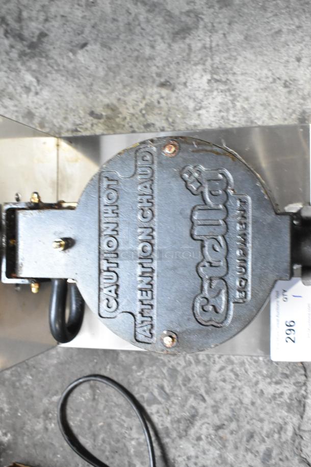 BRAND NEW scratch and dent Estella 348WBMX1A stainless steel commercial Belgian waffle maker, 120V, 1 phase. Tags warn "Caution Hot."