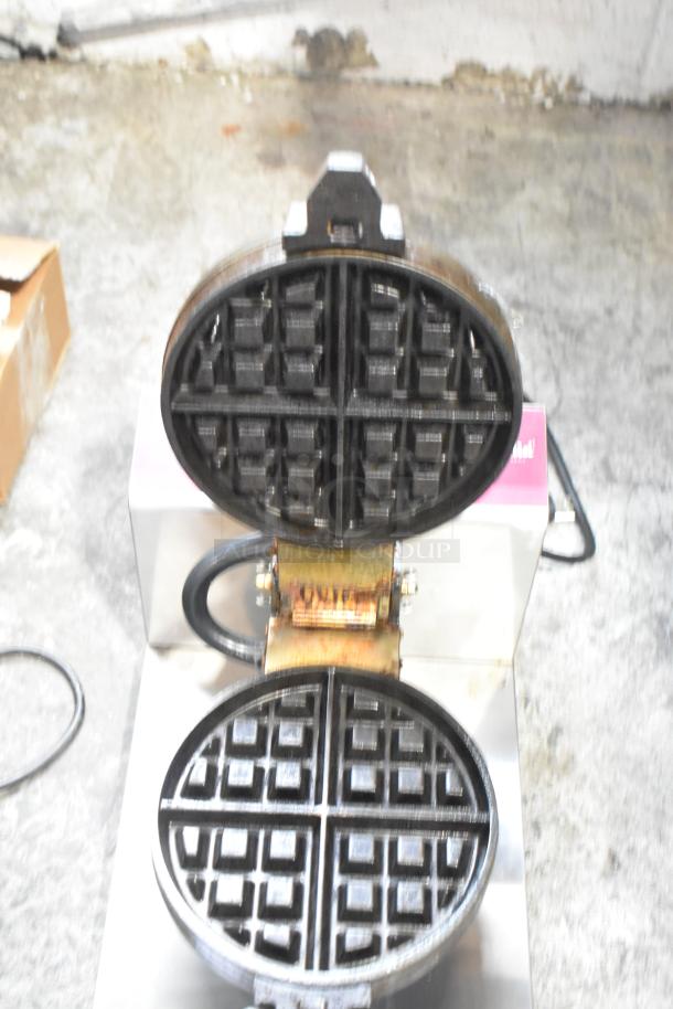Estella 348WBMX1A stainless steel Belgian waffle maker, brand new, 120V, 1 phase, open iron, slight scratches visible.