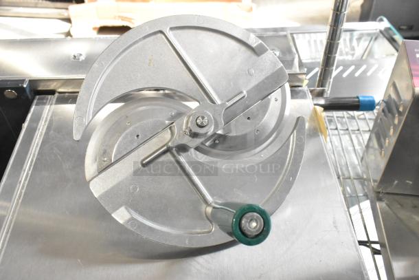 Three brand new blades, including two for vegetable slicers and one Robot Coupe food processor blade, stainless steel, slight scratches.