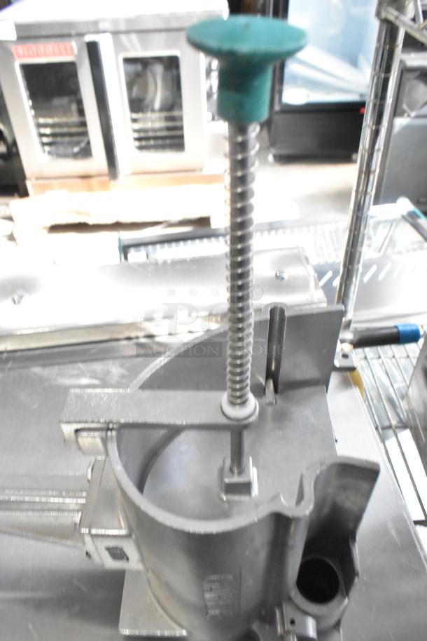 Three brand new scratch and dent items, including two Garde vegetable slicers and a metal collar, shown in detail.
