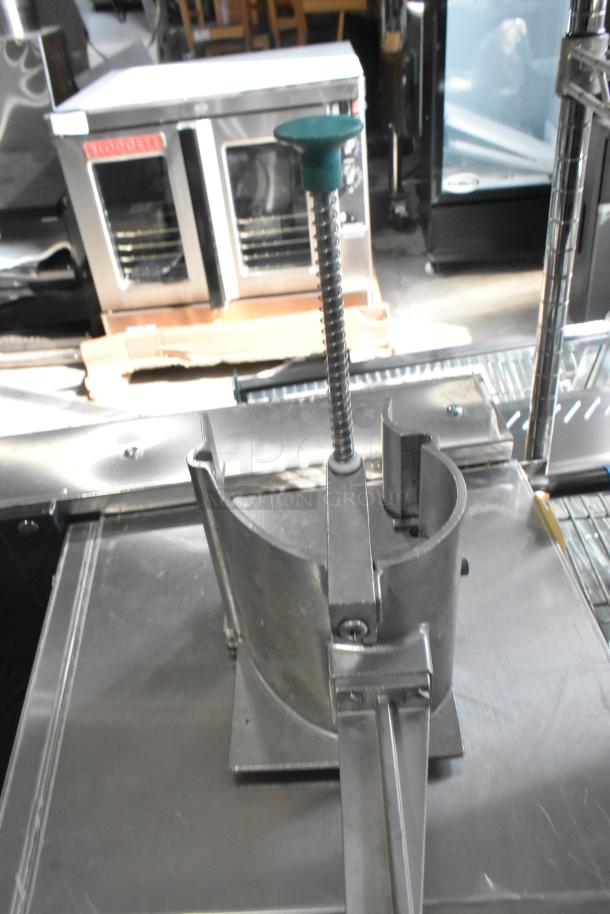 3 brand new scratch and dent items featuring Garde vegetable slicers and a metal collar in workshop setting.