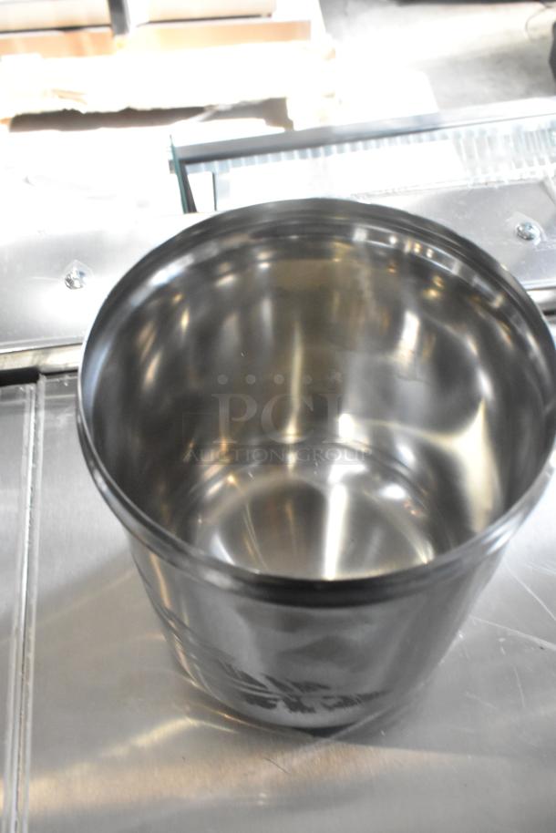Brand new 3 Qt. stainless steel inset jar. Polished finish, unboxed, part of 8-item auction lot.
