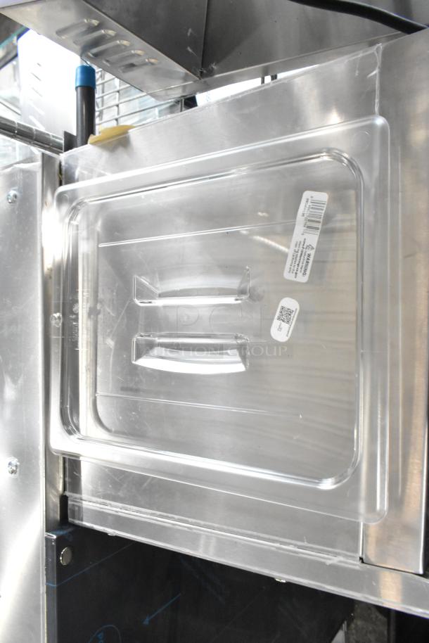 Eight brand new scratch and dent items; shown is a clear Cambro 20CWCH135 lid with barcode and warning label.