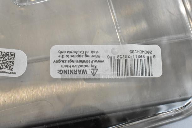 Clear polycarbonate handled lid with barcode and warning label, Cambro branding visible.