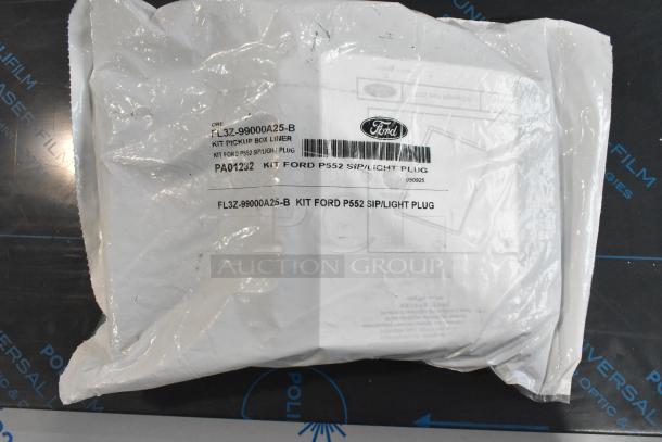 Brand new scratch and dent Ford FL3Z-99000A25-B plug kit in sealed packaging with visible labels.