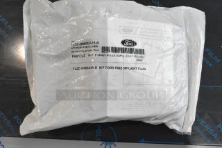 Brand new scratch and dent Ford FL3Z-99000A25-B plug kit in sealed packaging with visible labels.
