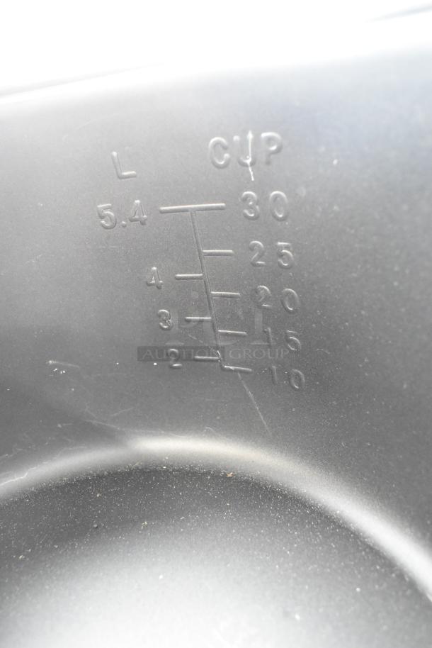 Brand new metal rice warmer insert, scratch and dent condition. Inner measurement markings up to 5.4L or 30 cups.