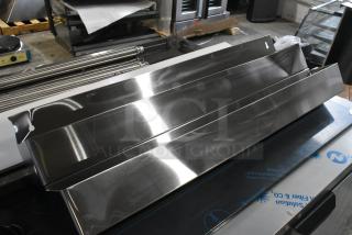 BRAND NEW Steelton 712B5536D Stainless Steel Double Tier Speed Rail, 36", slight scratches and dents visible.
