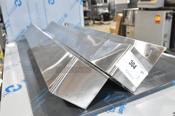 Steelton 712B5536D stainless steel double tier speed rail, 36", new condition, minor scratches, auction tag indicating lot 304.