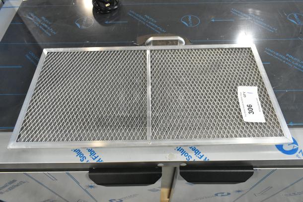 Brand new metal filter with minor scratches, sturdy mesh design, visible lot tag indicating quantity 1, number 306.
