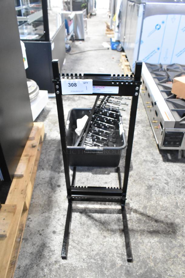 Brand new Garland Jack Stack Master of Space black metal rack, scratch and dent condition, auction tag visible.
