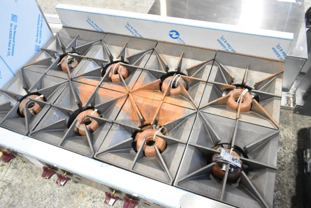 BRAND NEW Wolf AHP848-1 stainless steel 48" 8-burner countertop range. Scratch and dent condition. 240,000 BTU. Natural gas.