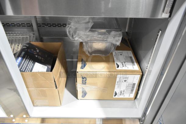 Beverage Air SPE48HC-S refrigerated salad bar, 48", stainless steel, interior view with boxed parts and manuals. Brand new, 115V.