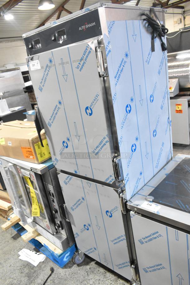 Brand new Alto Shaam 1200-UP stainless steel 16-pan holding cabinet, scratch and dent, universal racks, commercial casters.