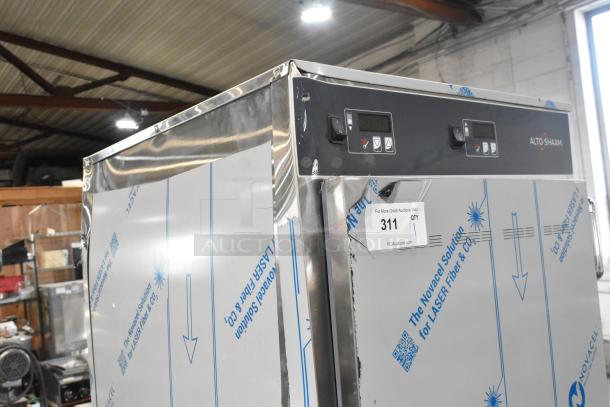 BRAND NEW Alto Shaam 1200-UP stainless steel mobile holding cabinet, 16-pan capacity, scratch and dent, with universal racks.