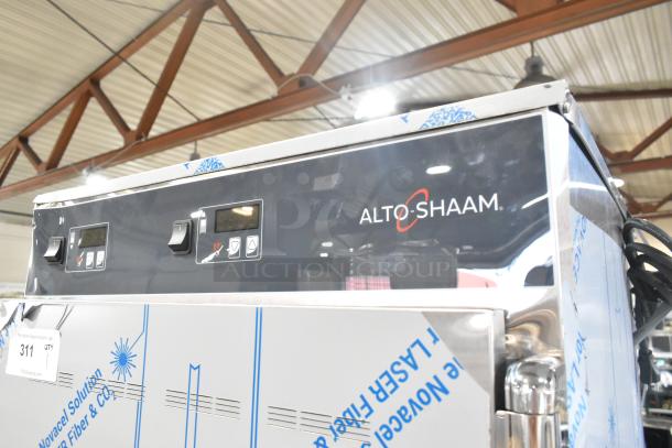 Brand new Alto Shaam 1200-UP stainless steel holding cabinet, universal racks, mobile on commercial casters, 120V, 1 phase.