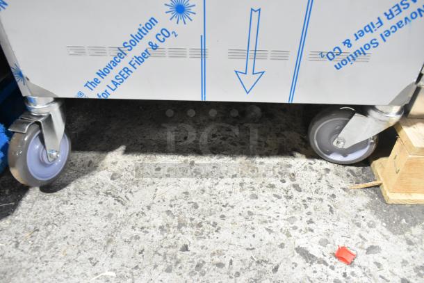 BRAND NEW Alto Shaam 1200-UP stainless steel holding cabinet with scratch and dent, on casters, showing Novacel protective cover.