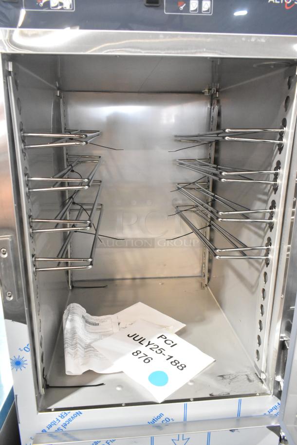 Alto Shaam 1200-UP stainless steel mobile 16-pan holding cabinet. New condition, universal racks, commercial casters.