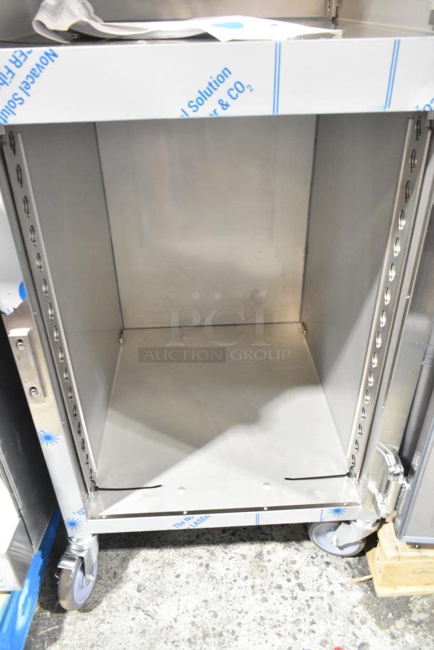 Brand new Alto Shaam 1200-UP stainless steel holding cabinet, 16 pan capacity, dutch doors, universal racks, on commercial casters.