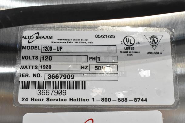 Alto Shaam 1200-UP stainless steel holding cabinet label, shows model, voltage, and certification details. Brand new condition.