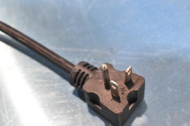 Close-up of electrical plug for 2024 Carnival King 382CDF17M stainless steel corn dog fryer, 208/240V, 1 phase.