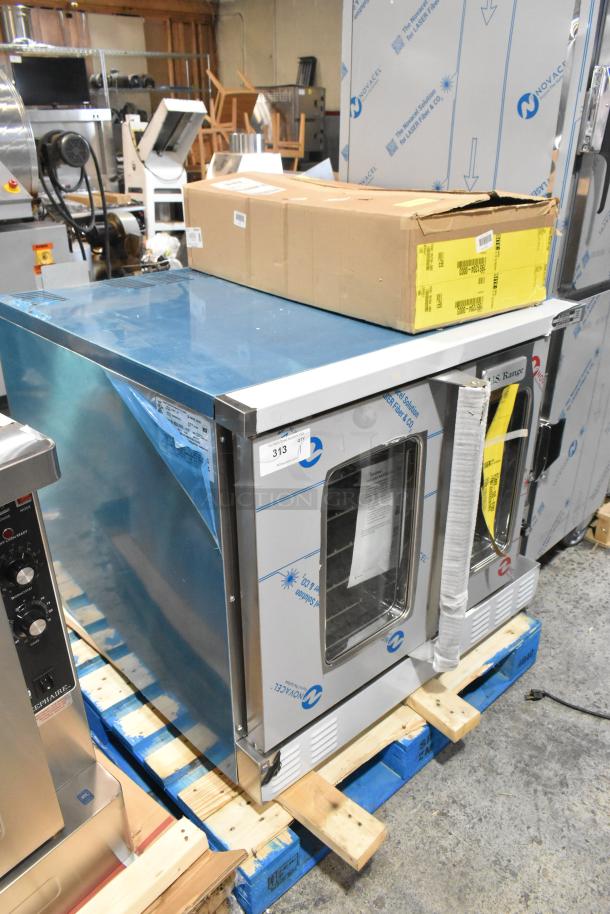 Brand new US Range/Garland SUMG-100 stainless steel single deck convection oven, view-through doors, 53,000 BTU, in original packaging.