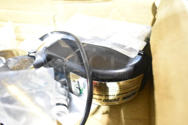 Brand new Zurn Elkay Z6915-XL AquaSense sensor faucet, 4" centers, 6 3/4" spout, .5 GPM, battery-powered, scratch and dent.