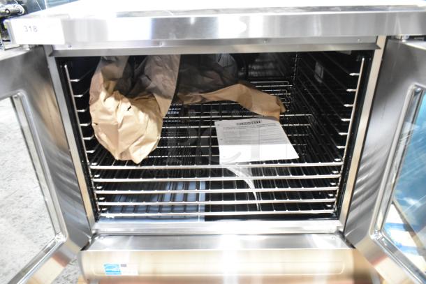 Brand new 2024 Blodgett ZEPHAIRE-200-E convection oven, stainless steel, bakery depth, view through doors, with draft diverter.