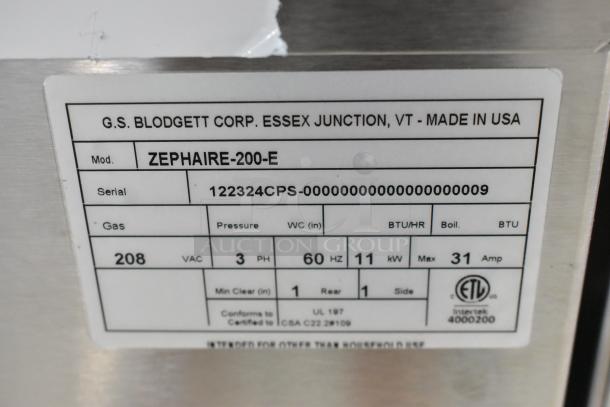 Label on Blodgett ZEPHAIRE-200-E convection oven, detailing electrical specs: 208V, 3 PH, 60 Hz, 11 kW, 31 Amp. Made in USA.
