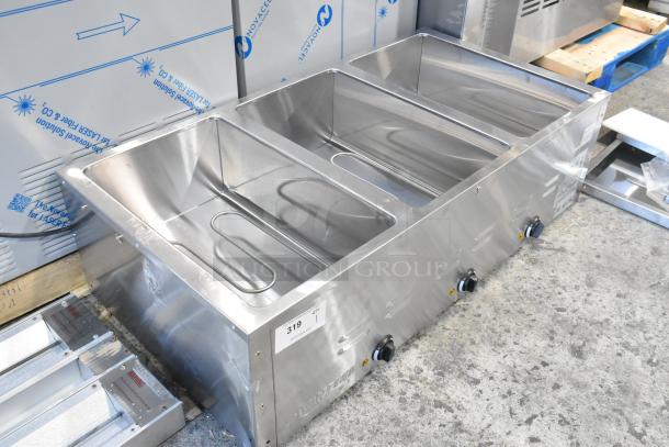 Brand new Avantco 177STE3S stainless steel electric steam table with three pans. Features small dents. 120 Volts, 1 Phase.