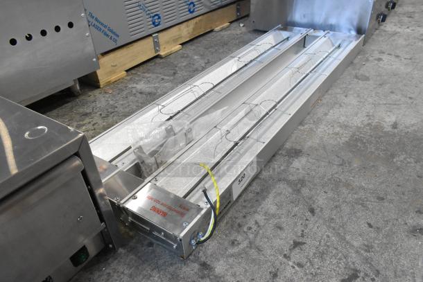 Brand new ServIt 423SW48THDBLA 48" double strip warmer, dual toggle controls, scratch and dent, 120V, 1 phase.