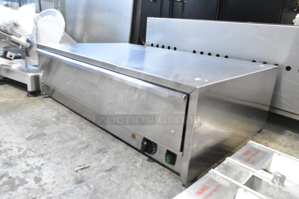 Brand new Avantco 177BW48 stainless steel 48" hot dog bun warmer. Scratch and dent. 120 volts, 1 phase.