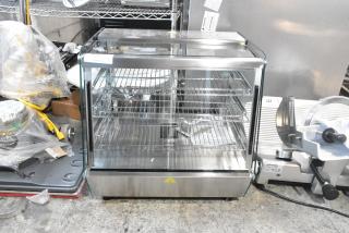 Brand new ServIt 423HDM26SA 26" heated display case with three shelves, sliding doors, and 120V, 1-phase power.