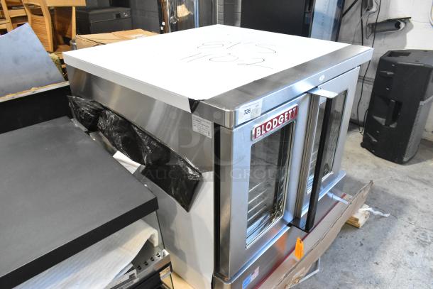 Brand new Blodgett ZEPHAIRE-200-E stainless steel electric convection oven with draft diverter, glass doors, and racks.