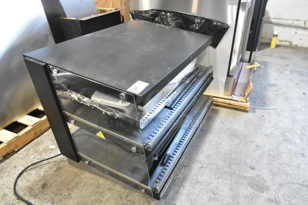 BRAND NEW, ServIt 423OAM121D, 42" slanted 2-shelf heated display merchandiser, 120V, 1 phase, minor scratches visible.