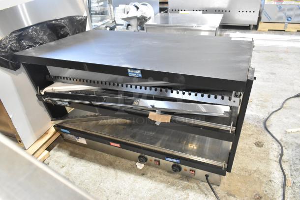 BRAND NEW ServIt 423OAM121D 42" countertop heated display merchandiser, 120V, 1 phase, minor scratches, labels visible.