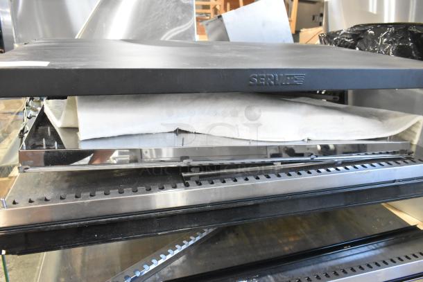 BRAND NEW ServIt 423OAM121D 42" heated display merchandiser, 2-shelf slanted, countertop, scratch and dent condition.