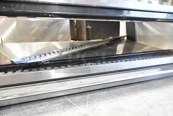 Brand new ServIt 423OAM121D heated display merchandiser, 42" slanted 2-shelf, 120 volts, scratch and dent.