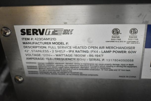 BRAND NEW SCRATCH AND DENT ServIt 423OAM121D heated display merchandiser label showing specs like 42", 120V, 1800W.