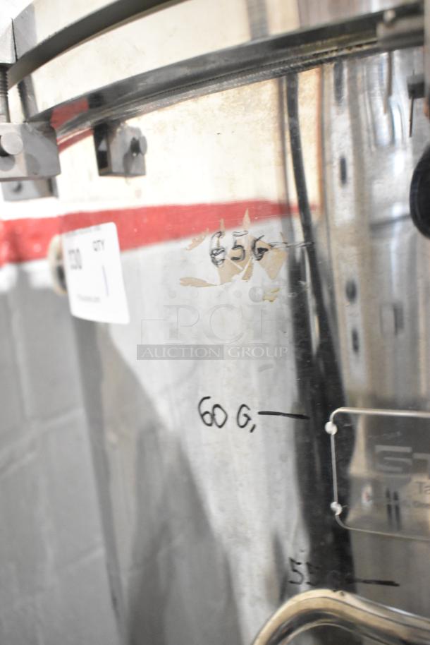 Stout stainless steel 60-gallon commercial kettle, on casters, with visible capacity markings and label, in good condition.