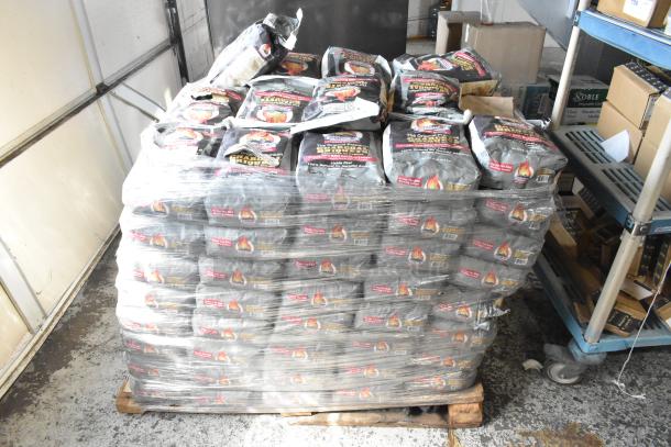 120 bags of Cooks Charcoal Briquets on a pallet, wrapped in plastic. Ideal for grilling. Bid multiplier: 120 times.