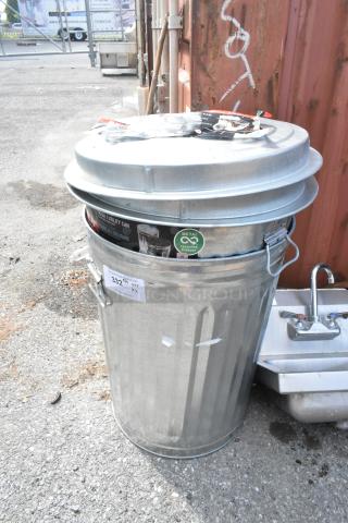 Behrens 1211K 20 Gallon galvanized steel trash can with Infinity Lid, new condition, labels visible, outdoor setting.