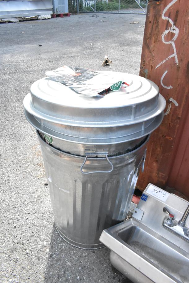 Behrens 1211K 20-gallon galvanized steel trash can with Infinity Lid, scratch and dent, tag on lid, unused condition.