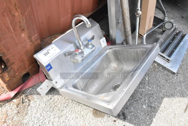 Stainless steel single bay sink with faucet and handles, NSF marked, item tag 333, slight wear visible.