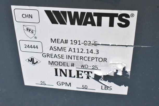 Brand new Watts WD-25 grease trap, 50 lb capacity. Scratch and dent condition, model and specs visible on label.