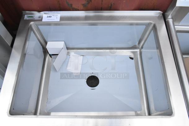 BRAND NEW Regency 600SM202812 stainless steel mop sink. One compartment, 16-gauge, 33" size, with visible dent.