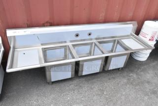 Regency 600S31515215 stainless steel 3-bay sink with dual drain boards, scratch and dent, no legs, brand new condition.