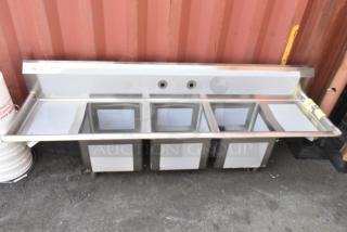 Regency 600S31515215 stainless steel 3 bay sink with dual drain boards, brand new with minor dents. No legs included.