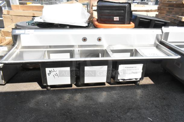 Brand new Regency 600S31515215 stainless steel 3 bay sink with dual drain boards, no legs, scratch and dent condition.