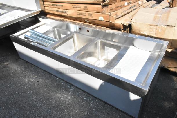 Brand new Regency 3 Bowl Underbar Sink, 60" x 18 3/4", with two drainboards, stainless steel, scratch and dent condition.